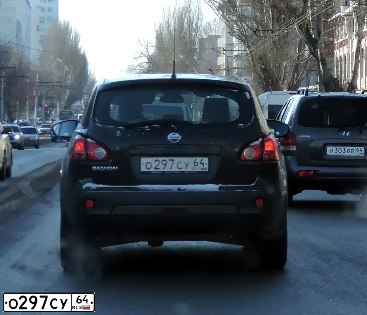 Фото автомобиля NISSАN QАSНQАI 2.0, 2008 — госномер О297СУ64. Цвет: ЧЕРНЫЙ
