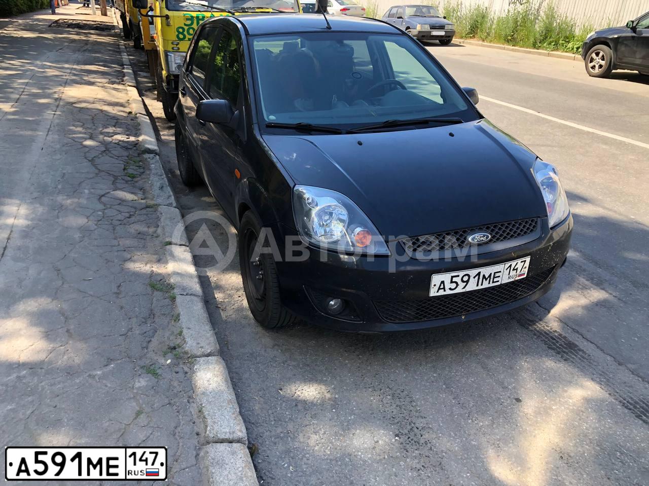 Фото автомобиля FORD FIESTA / ASPIRE, 2007 — госномер Н775ХВ198. Цвет: ЧЕРНЫЙ