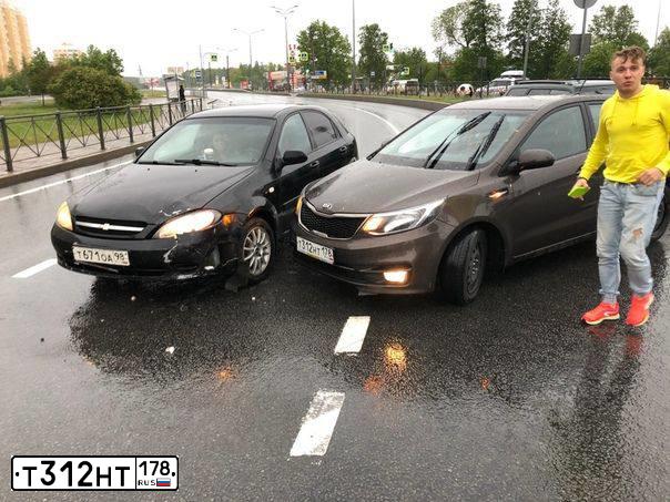 Фото автомобиля KIA RIO, 2015 — госномер Т312НТ178. Цвет: КОРИЧНЕВЫЙ