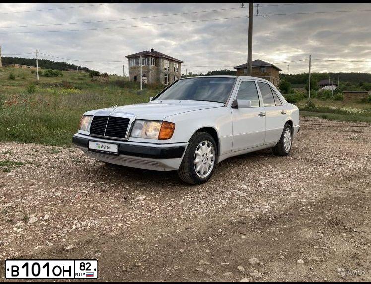 Фото автомобиля MERCEDES E-KLASSE, 1987 — госномер О001ОО23. Цвет: Белый