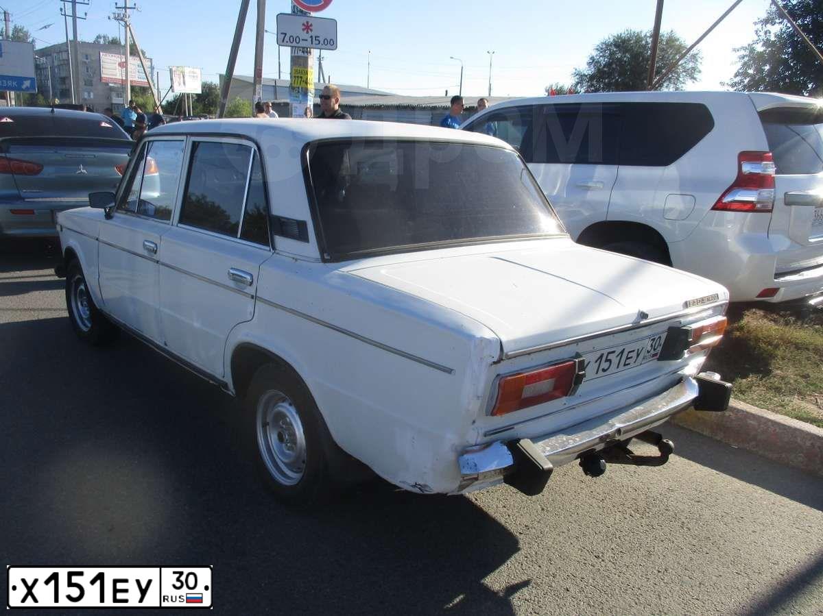 Фото автомобиля LADA 2106, 1995 — госномер Х151ЕУ30. Цвет: БЕЛЫЙ