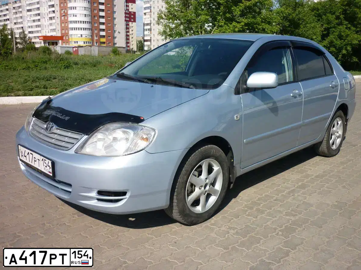 Фото автомобиля TOYOTA COROLLA, 2006 — госномер Е422ХН22. Цвет: СВЕТЛО-ГОЛУБОЙ