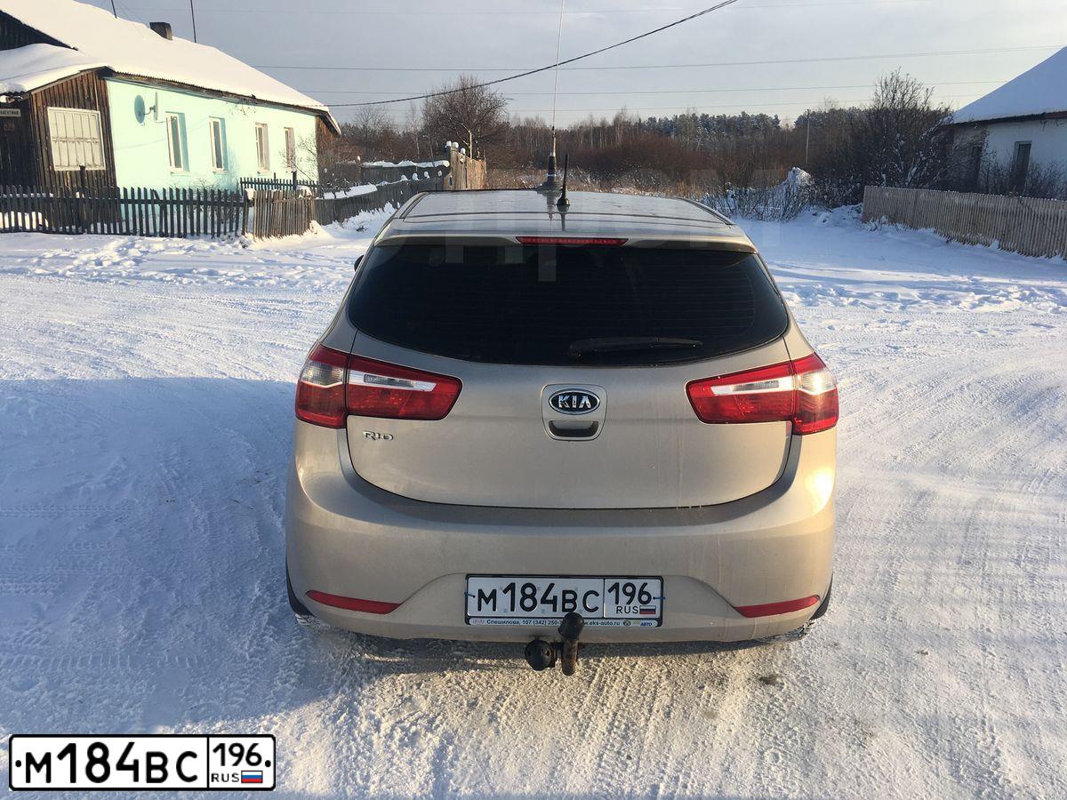Фото автомобиля KIA RIO, 2012 — госномер М184ВС196. Цвет: БЕЖЕВЫЙ
