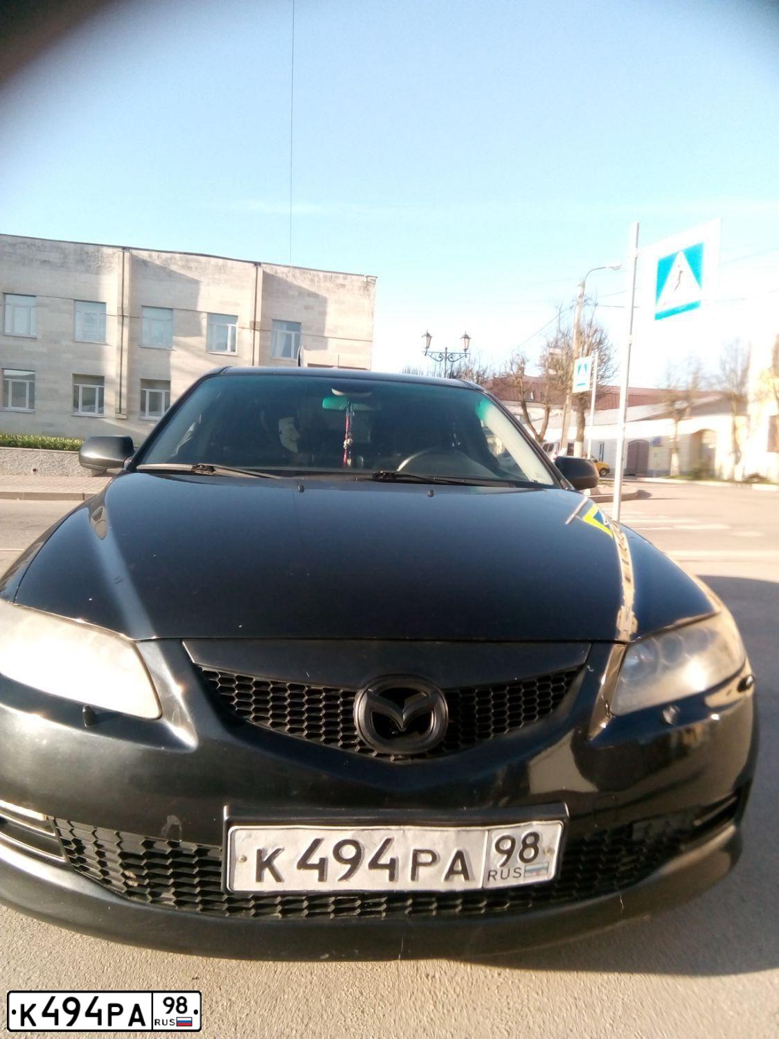 Фото автомобиля MAZDA 6, 2006 — госномер М705ТК69. Цвет: ЧЕРНЫЙ