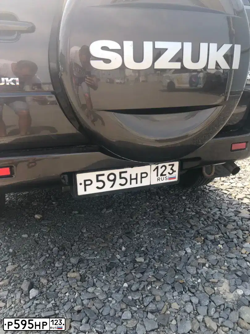 Фото автомобиля SUZUKI /GRAND/ VITARA, 2014 — госномер Р595НР123. Цвет: Коричневый