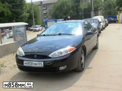 Фото автомобиля MERCURY COUGAR, 2001 — госномер М858ММ64. Цвет: ЧЕРНЫЙ