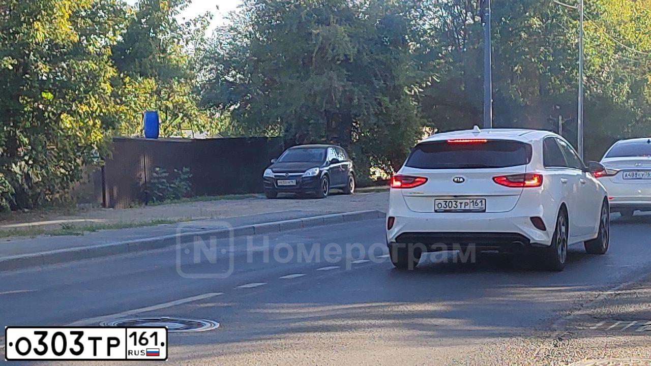 Фото автомобиля KIA CEE'D, 2014 — госномер О303ТР161. Цвет: Белый