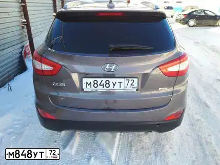 Фото автомобиля HYUNDAI IX35, 2013 — госномер М848УТ72. Цвет: Коричневый