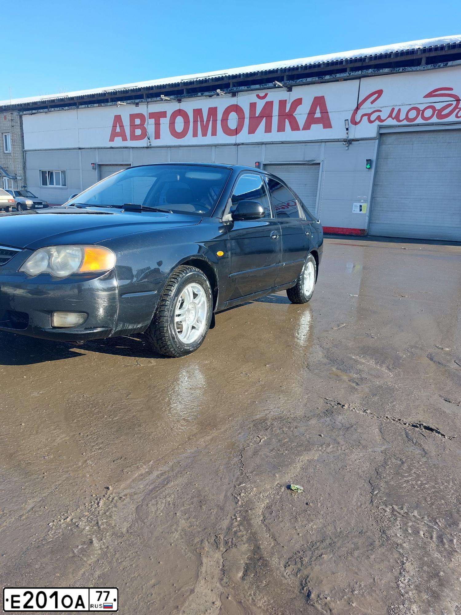 Фото автомобиля KIA SHUMA, 2004 — госномер К145ОЕ43. Цвет: ЧЕРНЫЙ