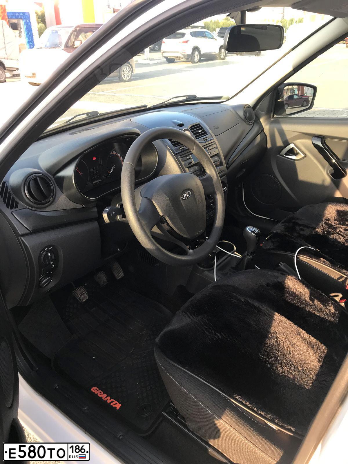 Фото автомобиля LADA 219060 LADA GRANTA, 2023 — госномер Е580ТО186. Цвет: Белый