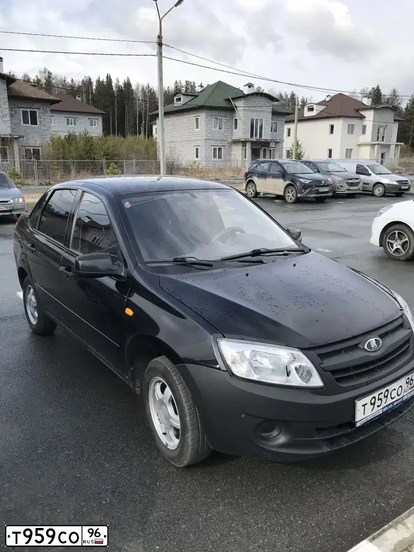 Фото автомобиля LADA 2190 GRANTA, 2012 — госномер Т959СО96. Цвет: Сине-Черный