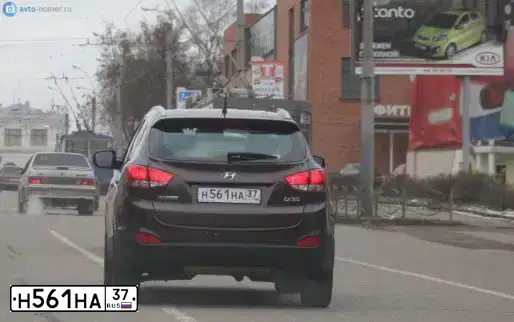 Фото автомобиля HYUNDAI IX35, 2010 — госномер Р708ТО39. Цвет: КОРИЧНЕВЫЙ