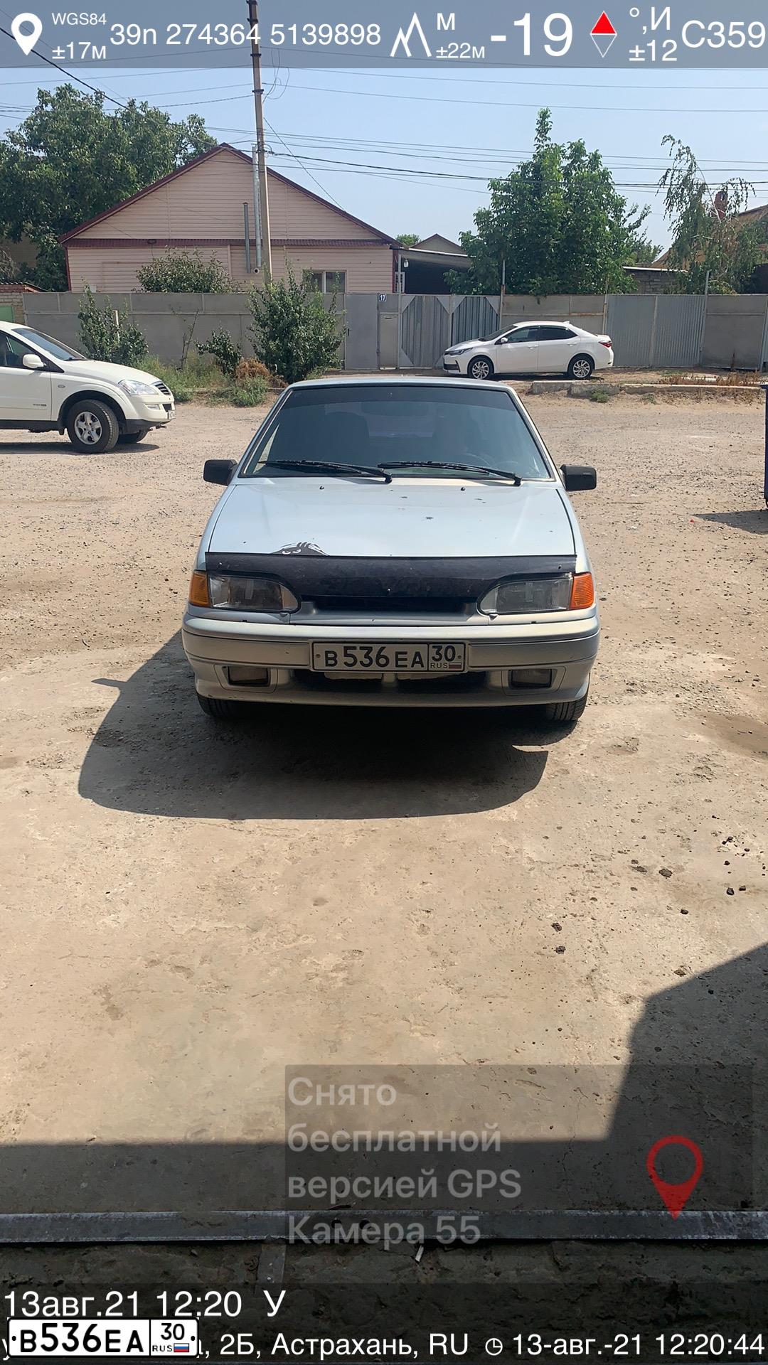 Фото автомобиля LADA 2114 SAMARA, 2007 — госномер В536ЕА30. Цвет: Серебристо-Желто-Голубой