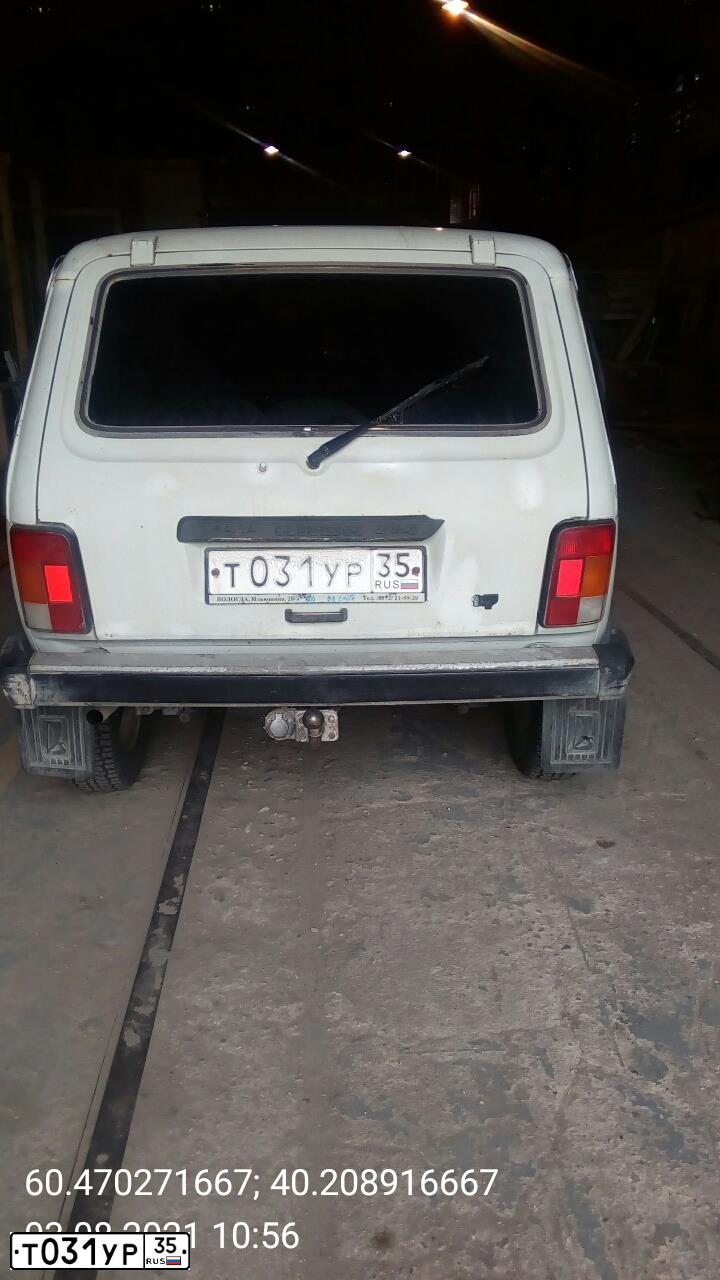 Фото автомобиля LADA 2121 NIVA, 1997 — госномер Т031УР35. Цвет: БЕЛЫЙ