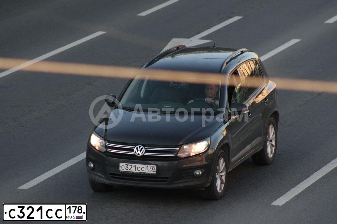 Фото автомобиля VOLKSWAGEN TIGUAN, 2015 — госномер Т590РМ198. Цвет: ТЕМНО-СЕРЫЙ