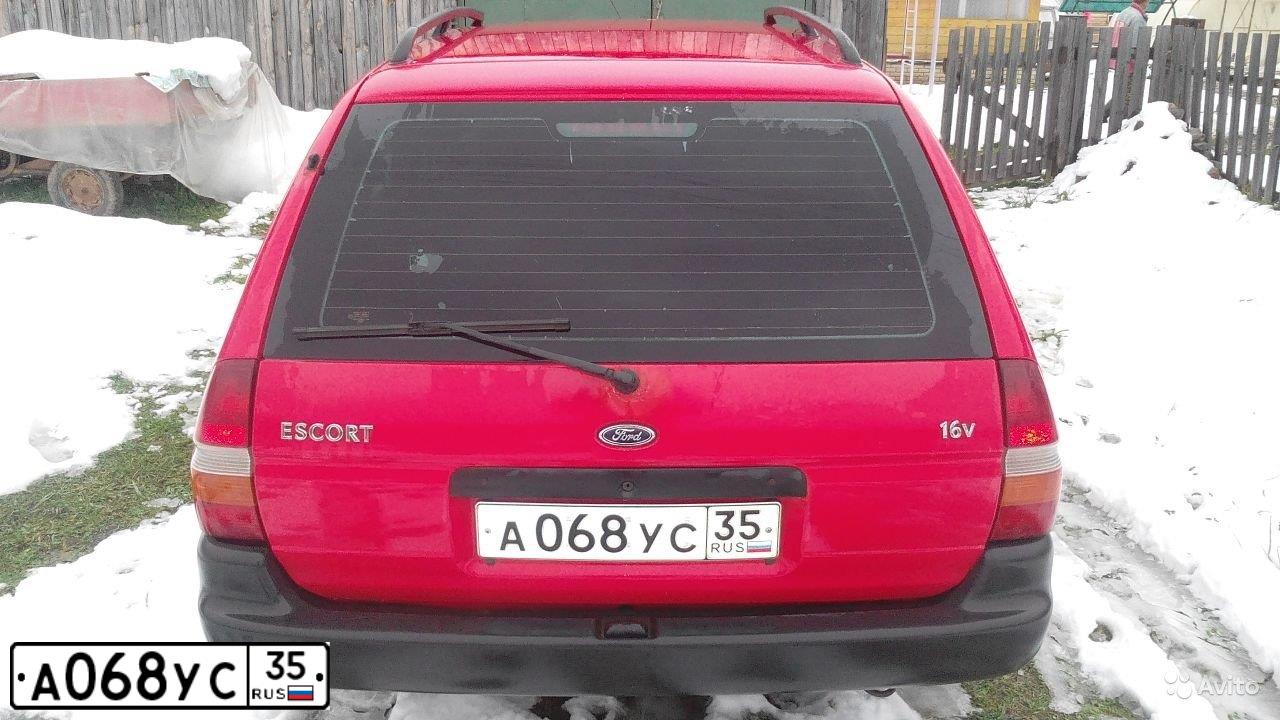 Фото автомобиля FORD ESCORT, 1998 — госномер К843СТ35. Цвет: Красный