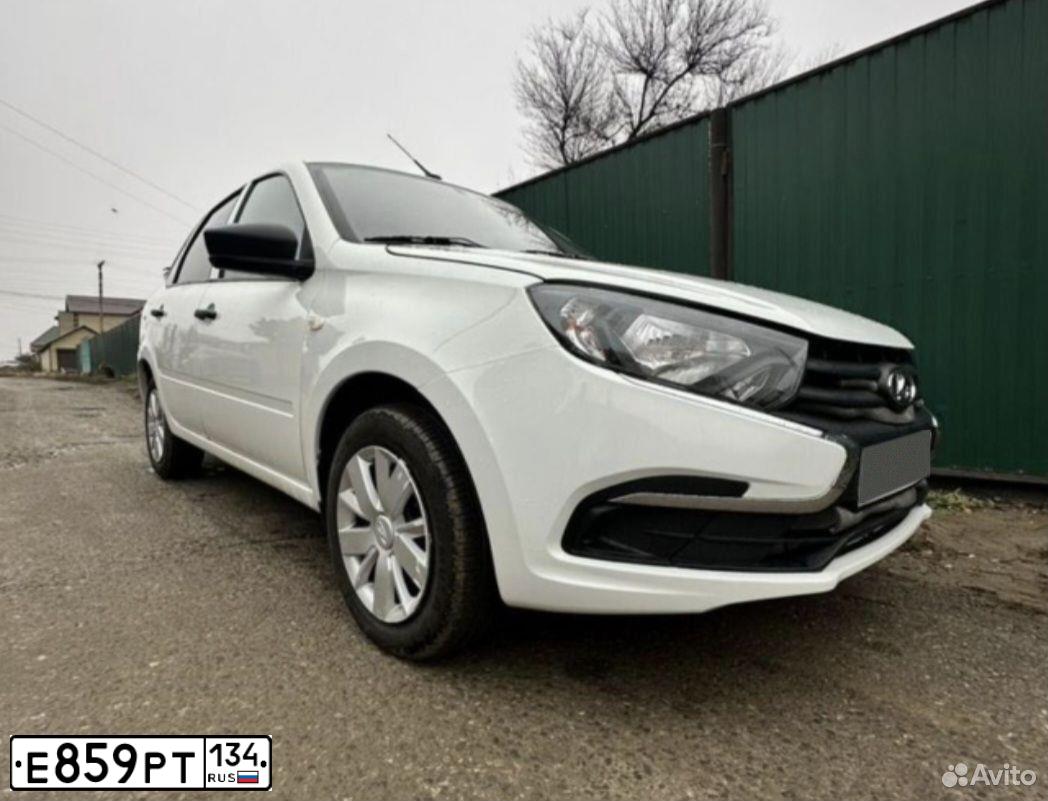 Фото автомобиля LADA 2190 GRANTA, 2019 — госномер Е859РТ134. Цвет: Белый