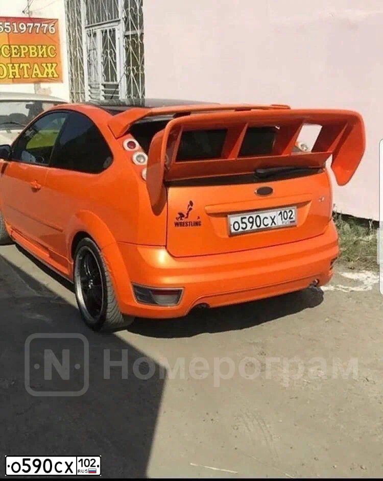 Фото автомобиля FORD D FOCUS, 2007 — госномер К700КО102. Цвет: Оранжевый