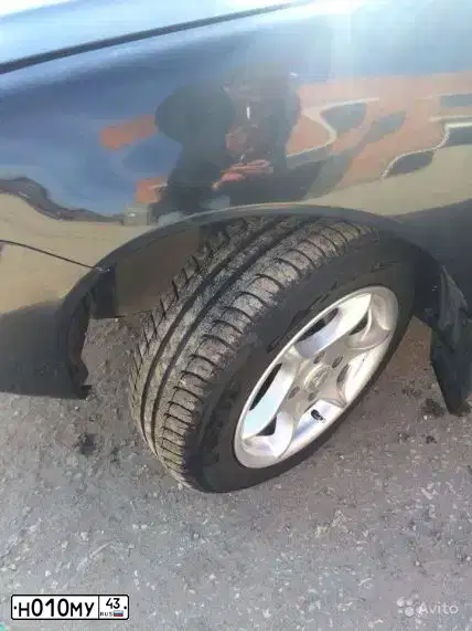 Фото автомобиля MITSUBISHI LANCER, 2004 — госномер Р059РВ11. Цвет: ЧЕРНЫЙ