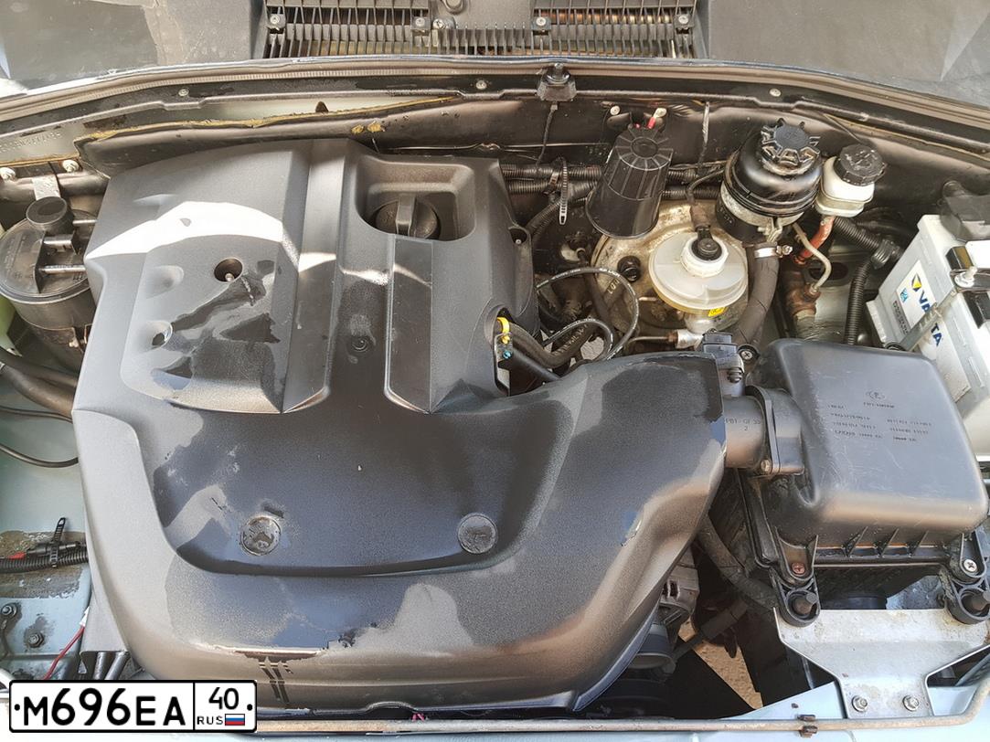 Фото автомобиля CHEVROLET NIVA, 2011 — госномер Р800УУ40. Цвет: Темно-серый металлик