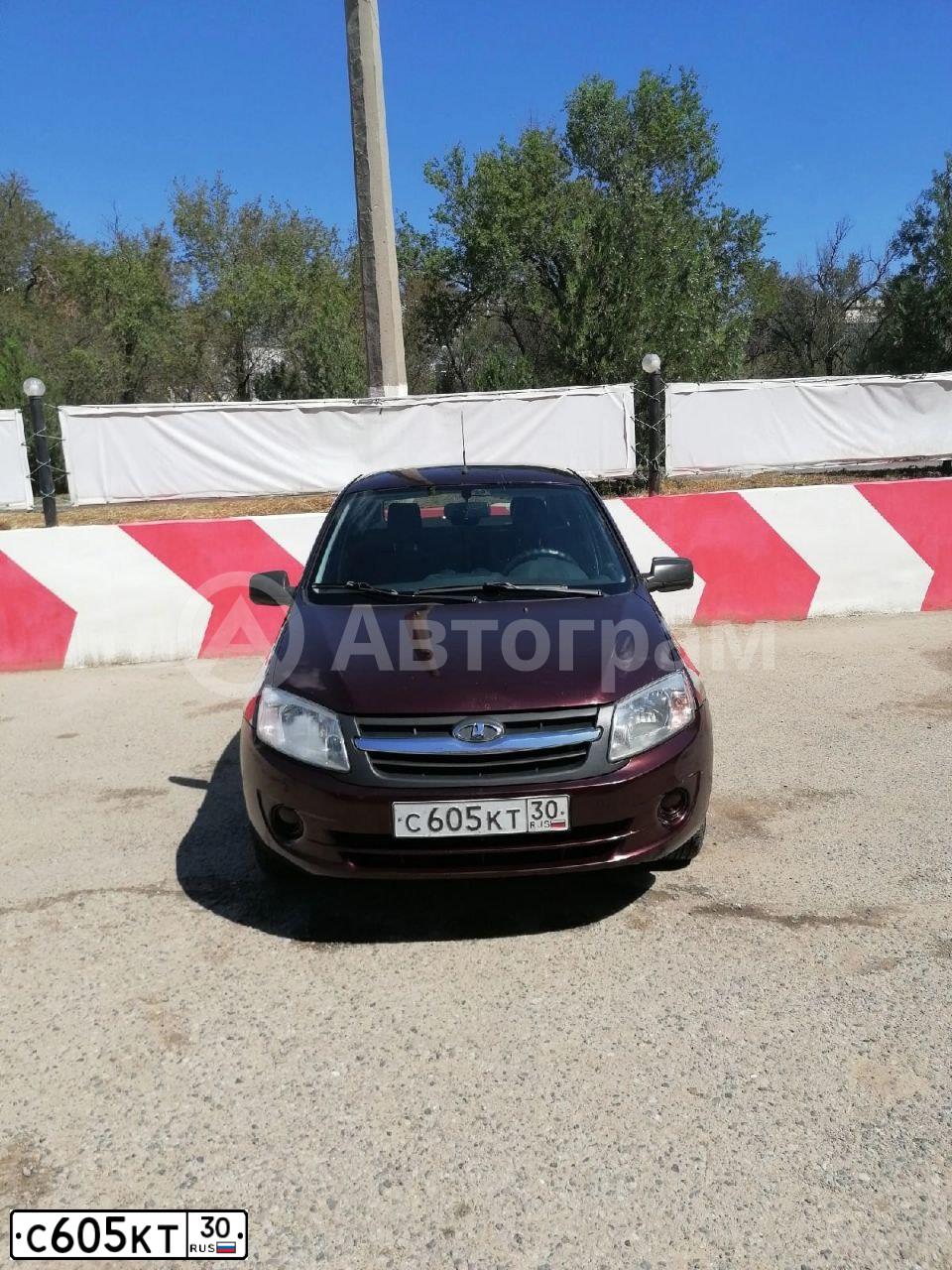Фото автомобиля LADA 2190 GRANTA, 2012 — госномер С605КТ30. Цвет: ТЕМНО-ВИШНЕВЫЙ