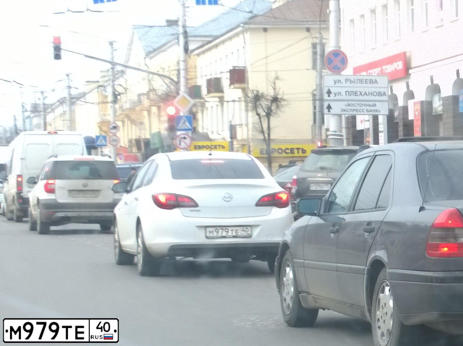 Фото автомобиля OPEL ASTRA, 2014 — госномер М979ТЕ40. Цвет: Белый