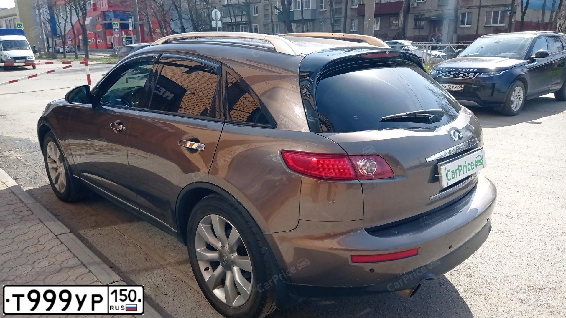 Фото автомобиля INFINITI QX70 /FX/, 2004 — госномер С028ХУ180. Цвет: Коричневый