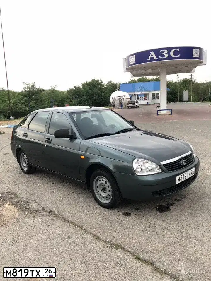 Фото автомобиля LADA 2172 PRIORA, 2010 — госномер М819ТХ26. Цвет: СЕРО СИНЕ-ЗЕЛЕНЫЙ