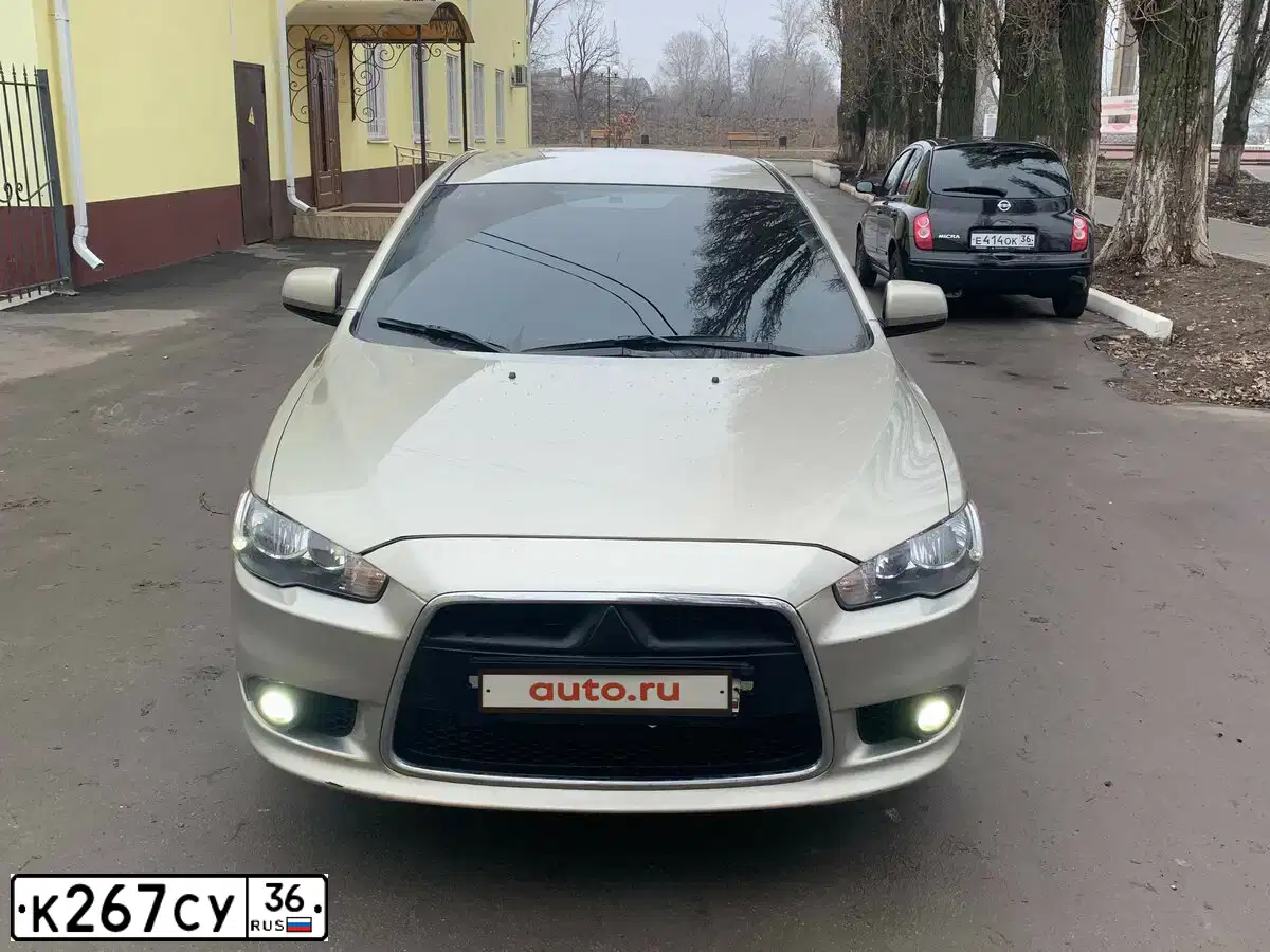 Фото автомобиля MITSUBISHI LANCER, 2010 — госномер К267СУ36. Цвет: БЕЖЕВЫЙ
