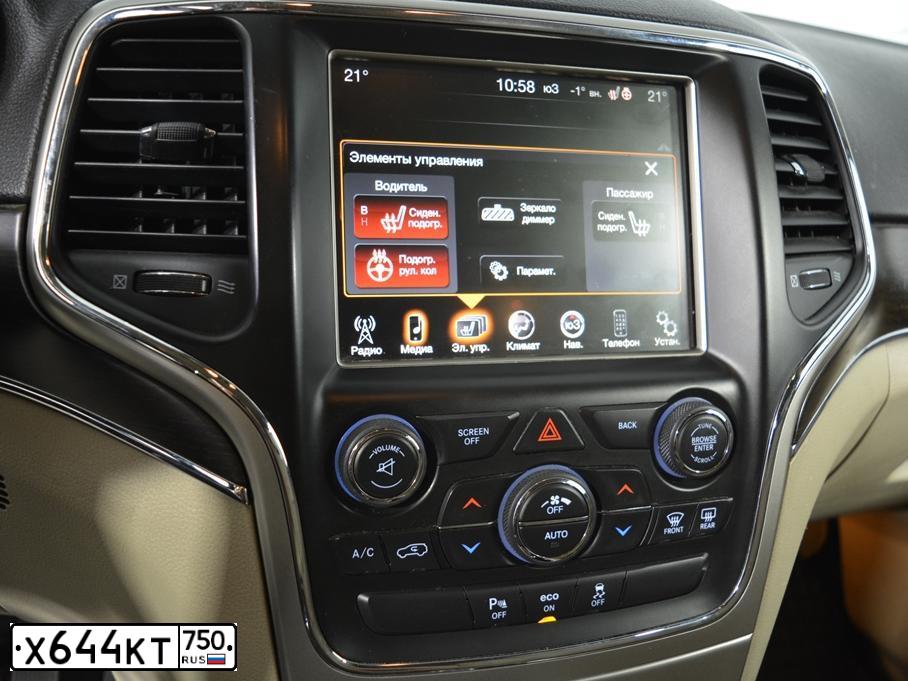 Фото автомобиля JEEP GRAND CHEROKEE, 2014 — госномер Р146ОО799. Цвет: СИНИЙ ТЕМНЫЙ