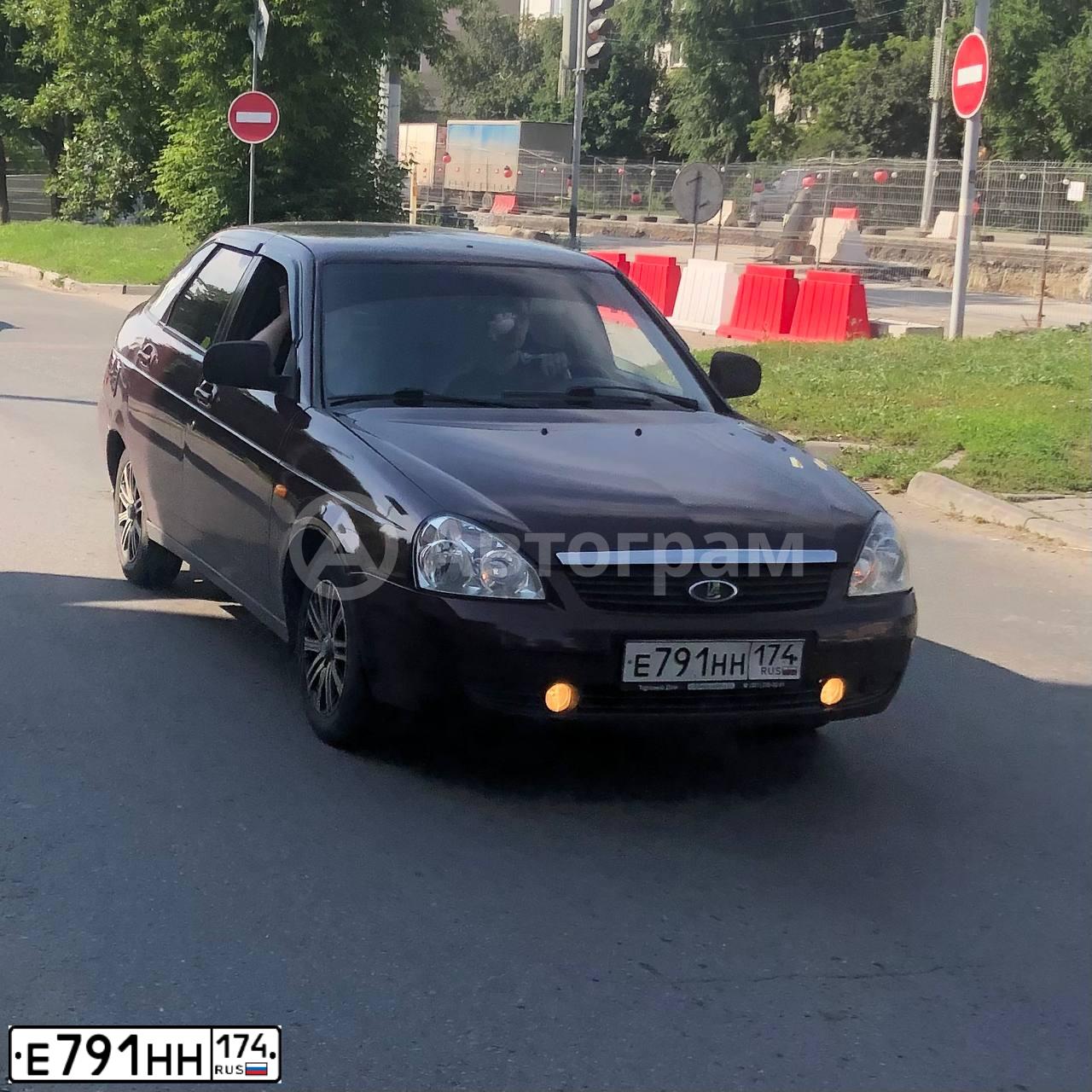 Фото автомобиля LADA 2172 PRIORA, 2011 — госномер Е791НН174. Цвет: ТЕМНО-ВИШНЕВЫЙ