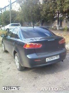 Фото автомобиля MITSUBISHI LANCER, 2007 — госномер Р104РВ152. Цвет: СИНИЙ