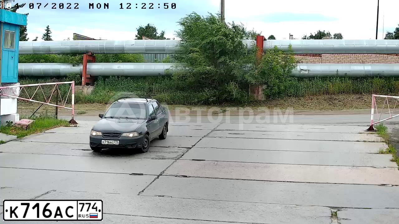 Фото автомобиля DAEWOO NEXIA, 2011 — госномер К716АС774. Цвет: Бледно-Черный