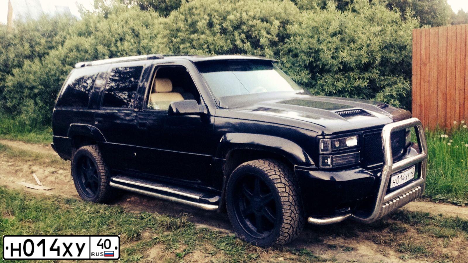 Фото автомобиля GMC YUKON, 1996 — госномер Н014ХУ40. Цвет: ЧЕРНЫЙ