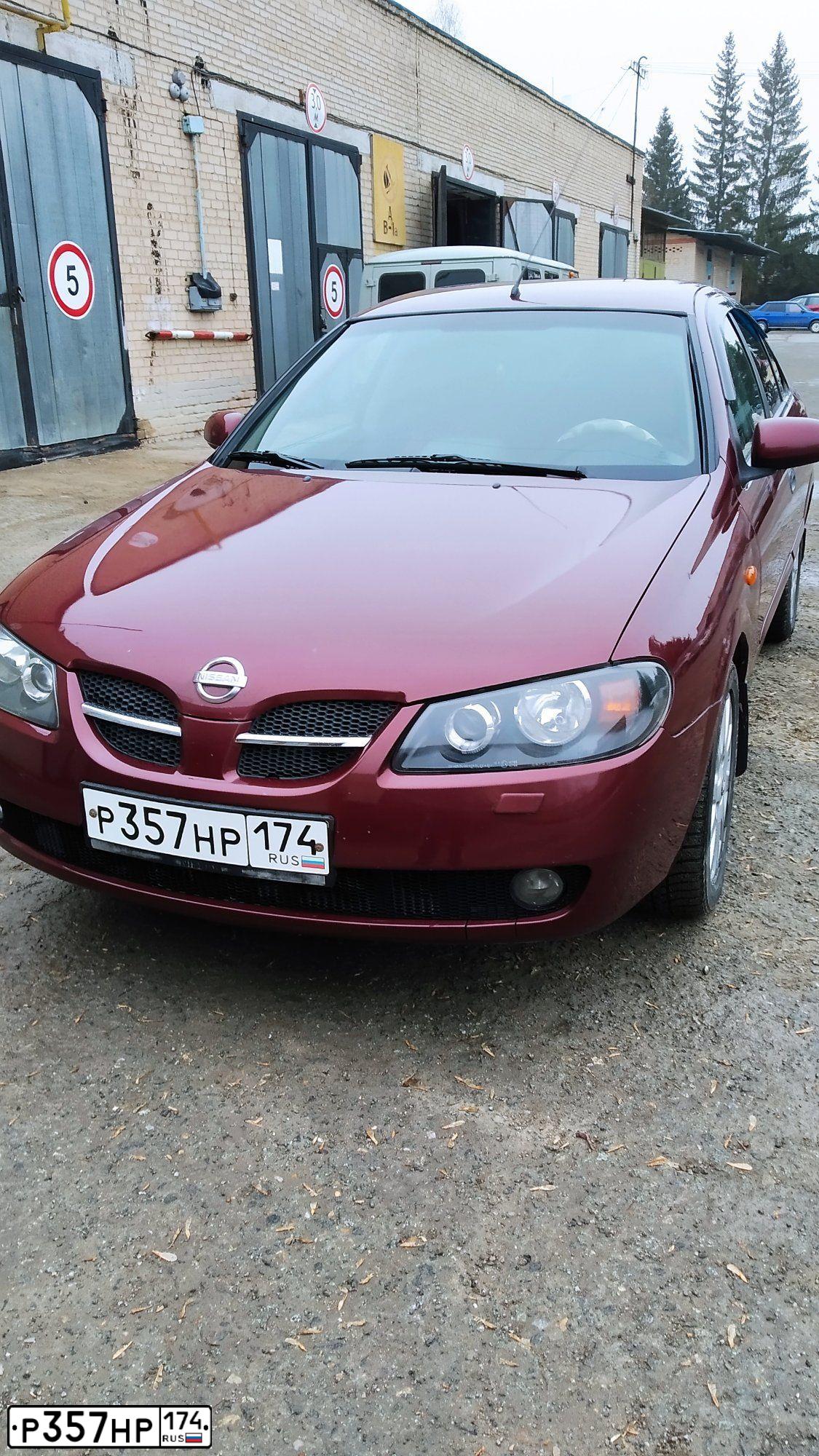 Фото автомобиля NISSAN ALMERA, 2004 — госномер Р357НР174. Цвет: ТЕМНО-КРАСНЫЙ