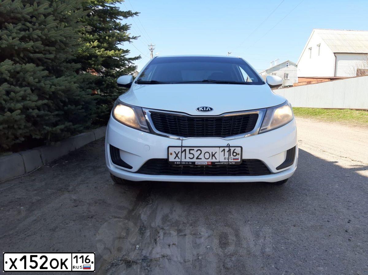 Фото автомобиля KIA RIO, 2014 — госномер К904ТН164. Цвет: Белый
