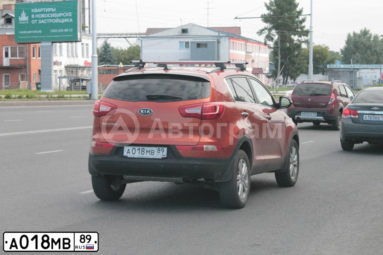 Фото автомобиля KIA SPORTAGE, 2011 — госномер А018МВ89. Цвет: ОРАНЖЕВЫЙ