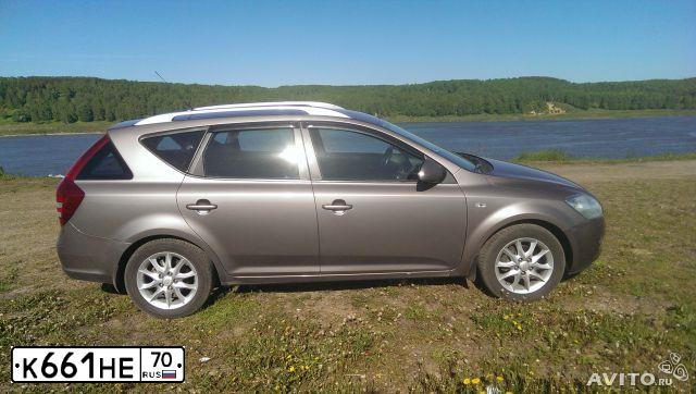 Фото автомобиля KIA CEE'D, 2008 — госномер К661НЕ70. Цвет: БЕЖЕВЫЙ