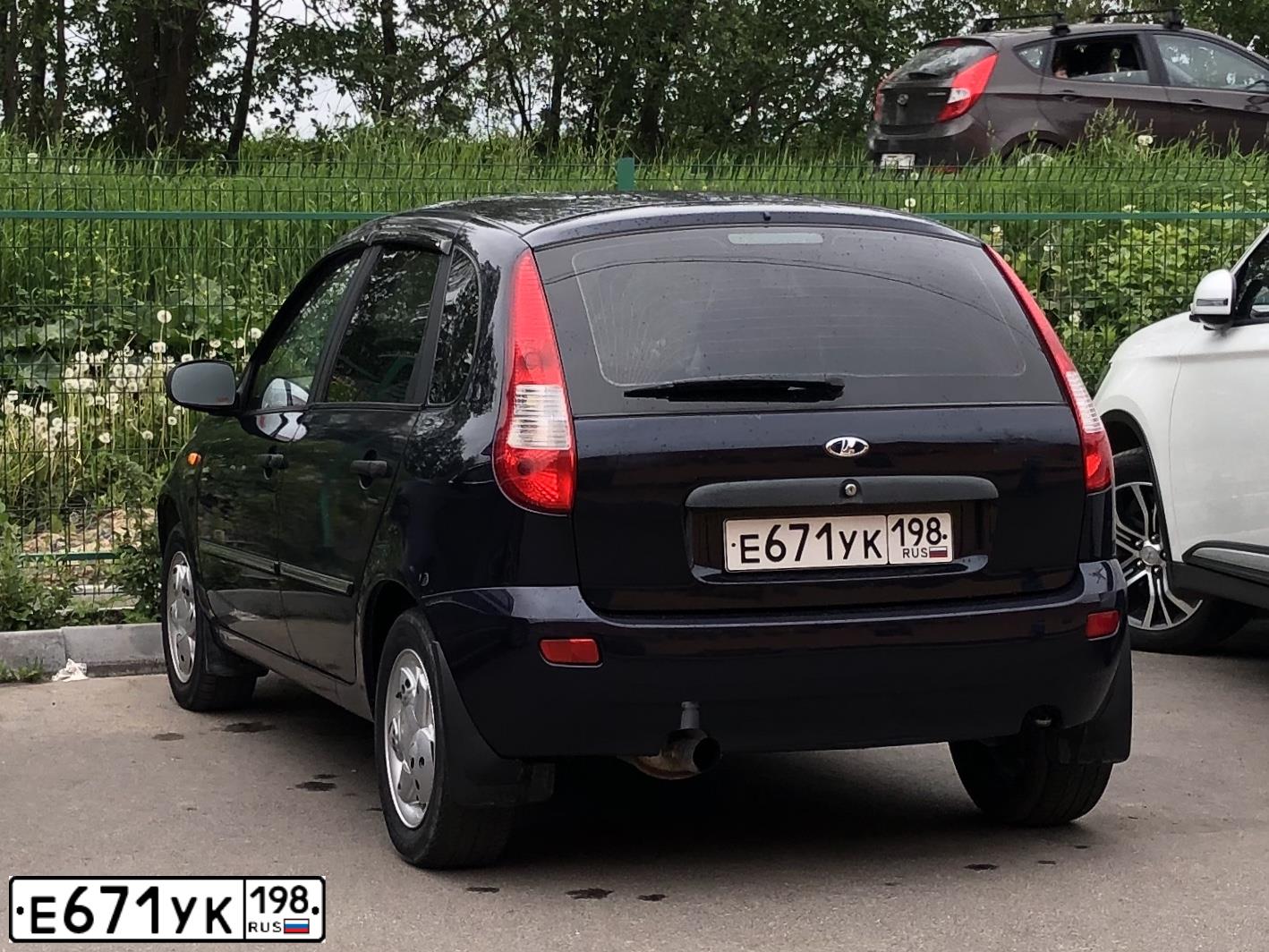 Фото автомобиля LADA 1119 KALINA, 2009 — госномер Р123АУ64. Цвет: ТЕМНЫЙ СИНЕ-ФИОЛЕТОВЫЙ
