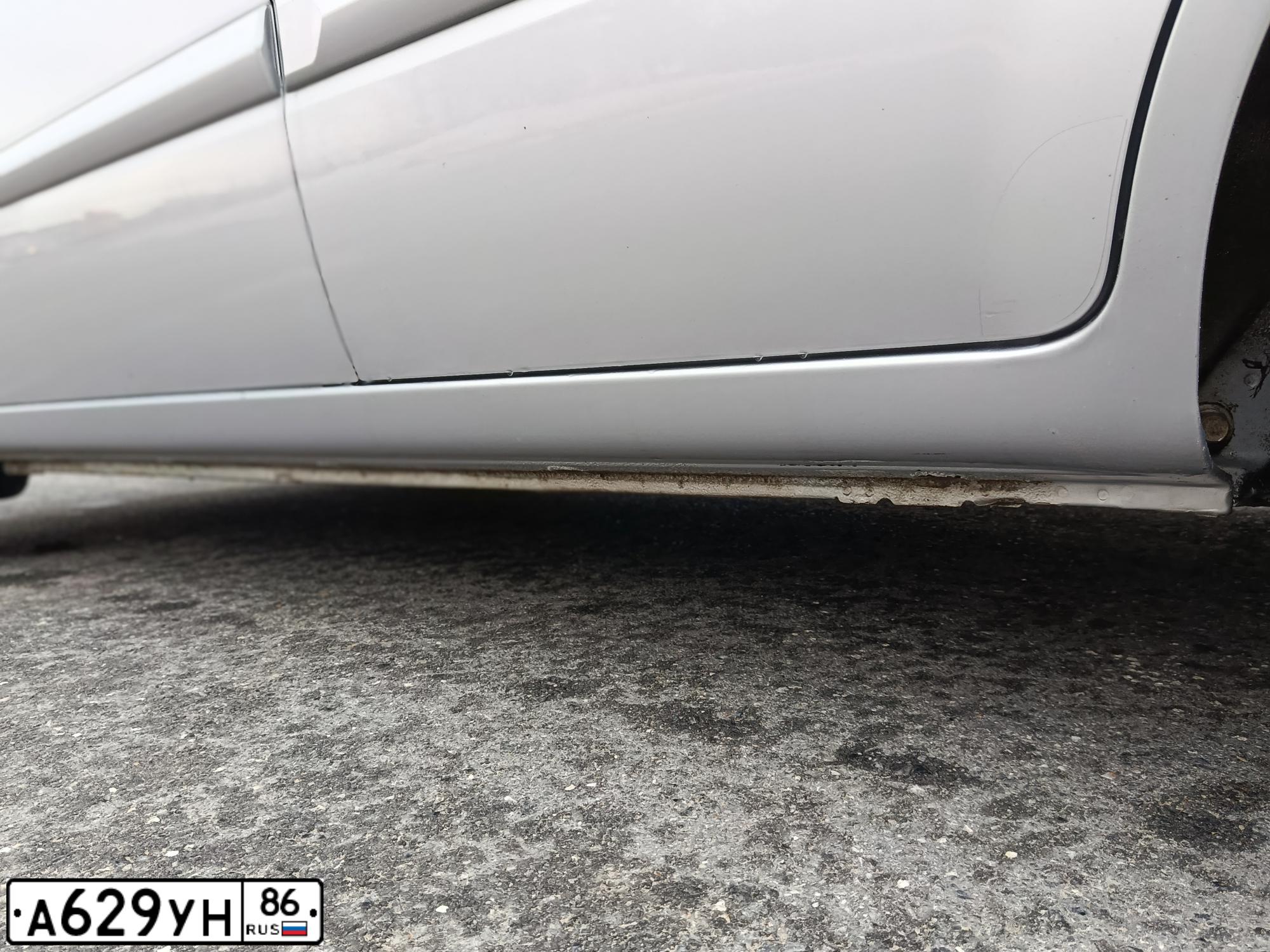 Фото автомобиля KIA RIO, 2010 — госномер А629УН86. Цвет: Серебристый