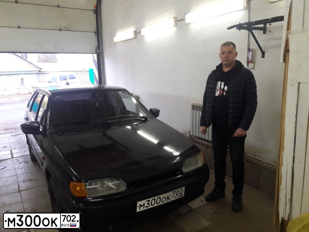 Фото автомобиля LADA 2114 SAMARA, 2008 — госномер М300ОК702. Цвет: Темно-зеленый
