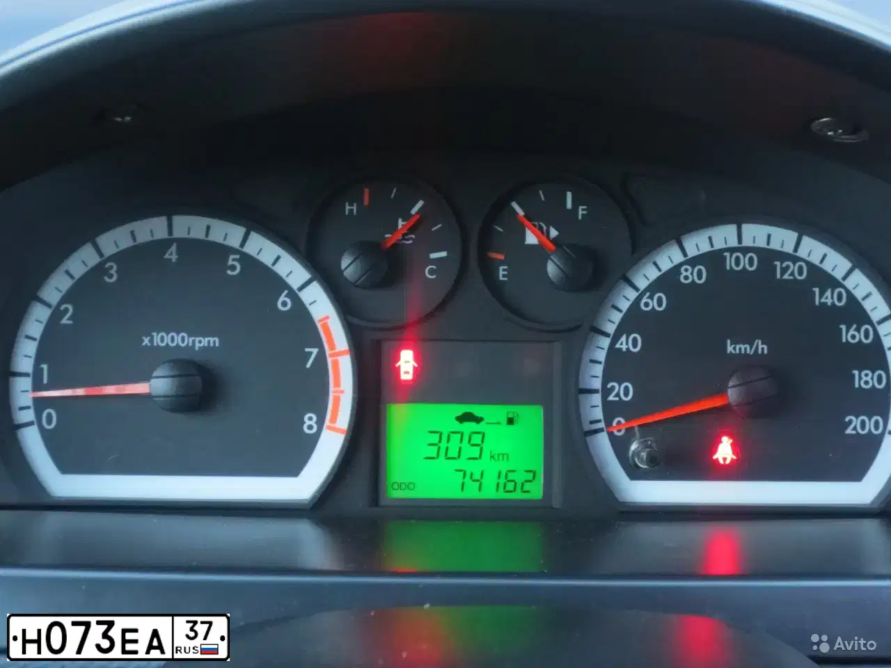Фото автомобиля CHEVROLET AVEO, 2010 — госномер Н073ЕА37. Цвет: СЕРЫЙ