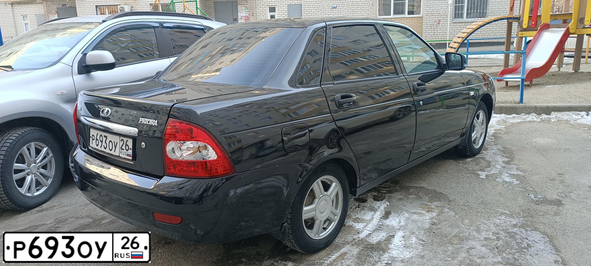 Фото автомобиля LADA 2170 PRIORA, 2008 — госномер Р693ОУ26. Цвет: Темно-зеленый