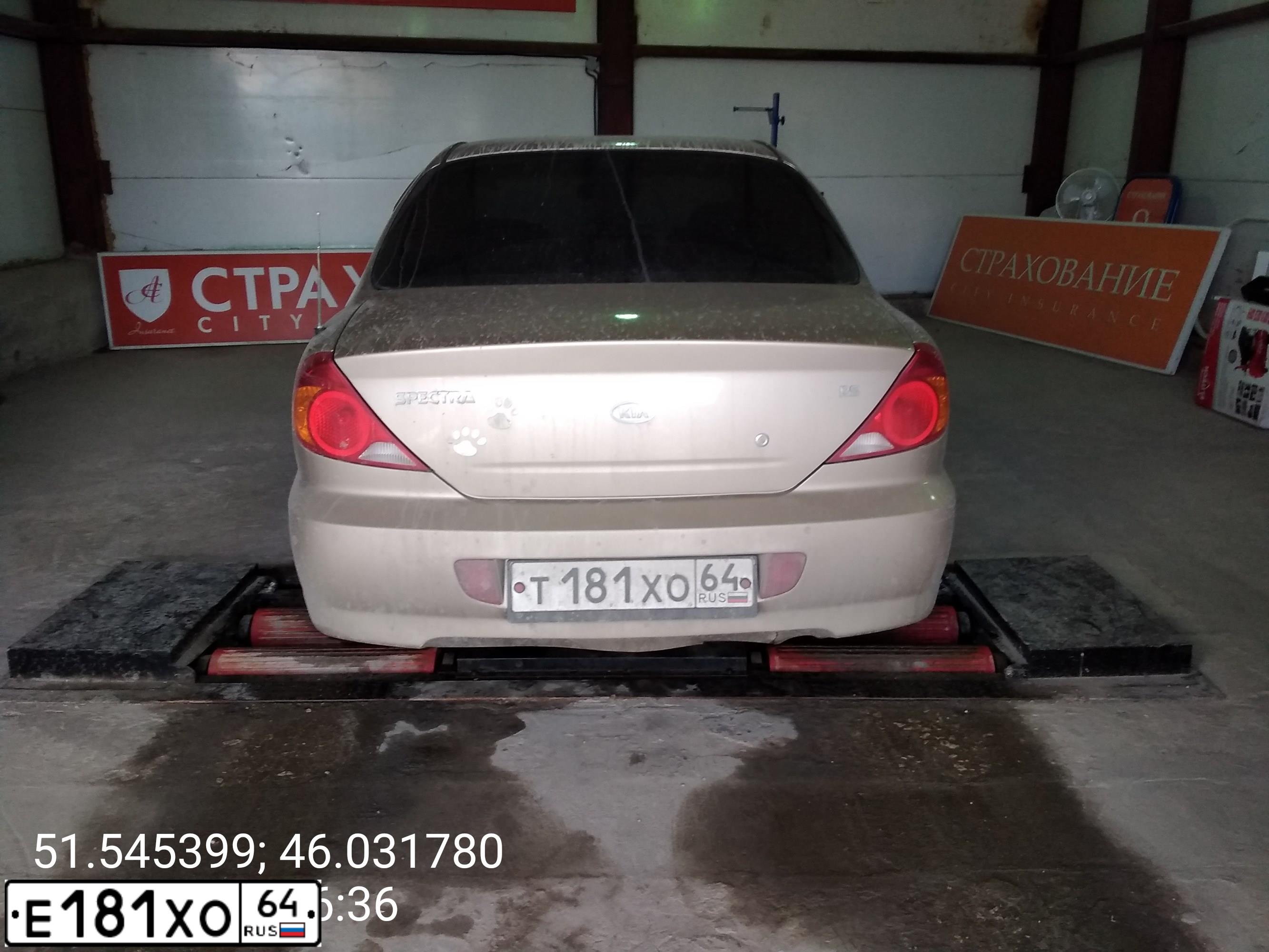 Фото автомобиля KIA SPECTRA, 2009 — госномер Т181ХО64. Цвет: ЗОЛОТИСТО БЕЖЕВЫЙ