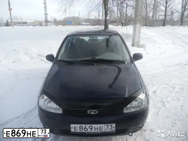 Фото автомобиля LADA 1117 KALINA, 2008 — госномер Е869НЕ73. Цвет: ТЕМНЫЙ СИНЕ-ФИОЛЕТОВЫЙ