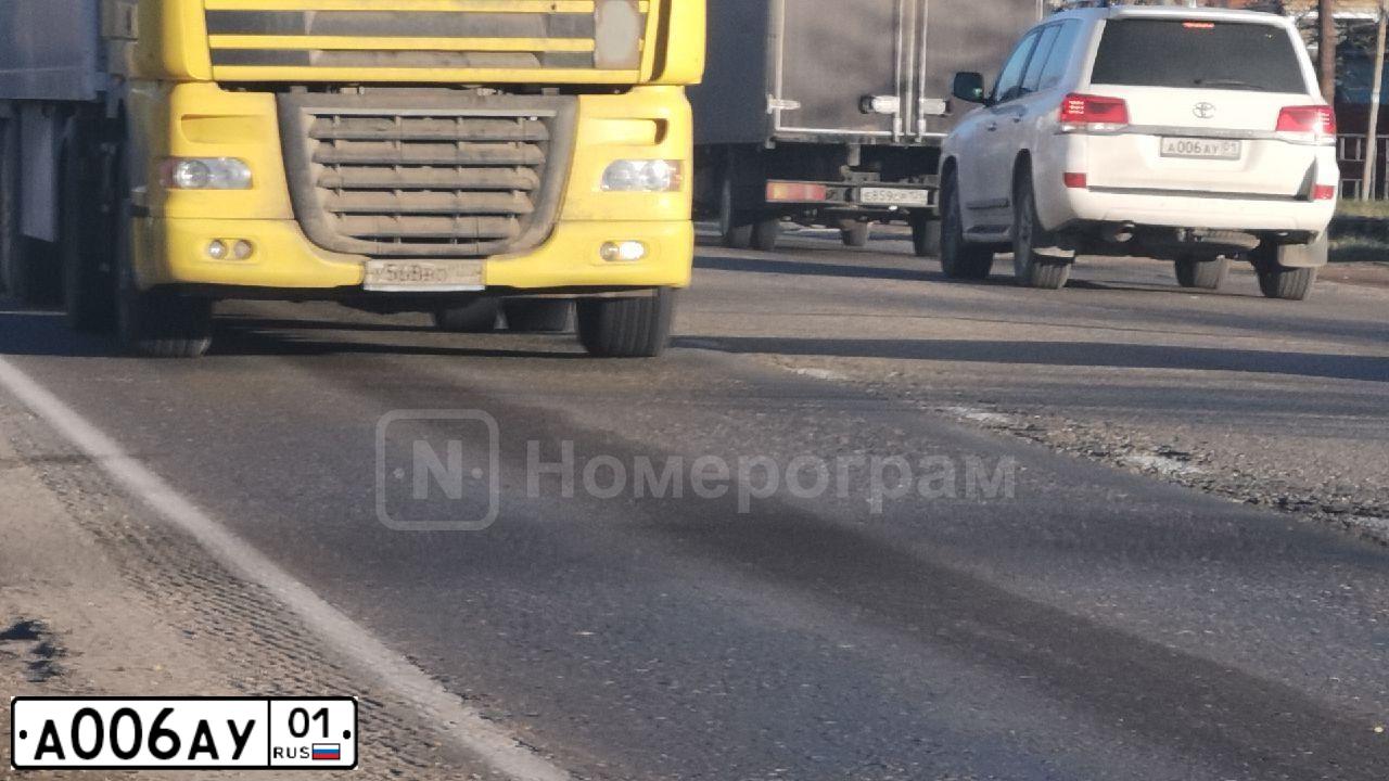 Фото автомобиля MITSUBISHI LANCER, 2003 — госномер Е116ЕО11. Цвет: СЕРЫЙ