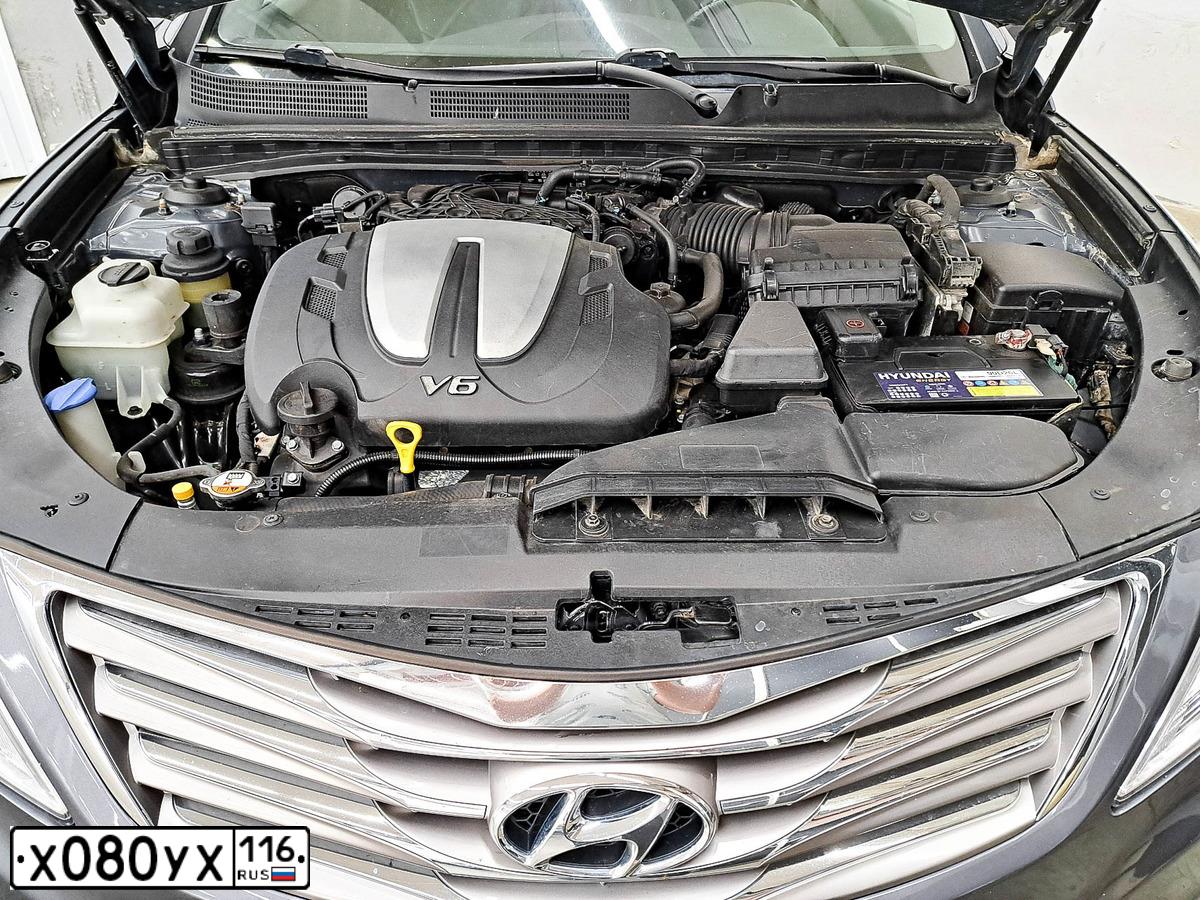 Фото автомобиля HYUNDAI GRANDEUR, 2012 — госномер М983ТТ716. Цвет: ТЕМНО-СЕРЫЙ