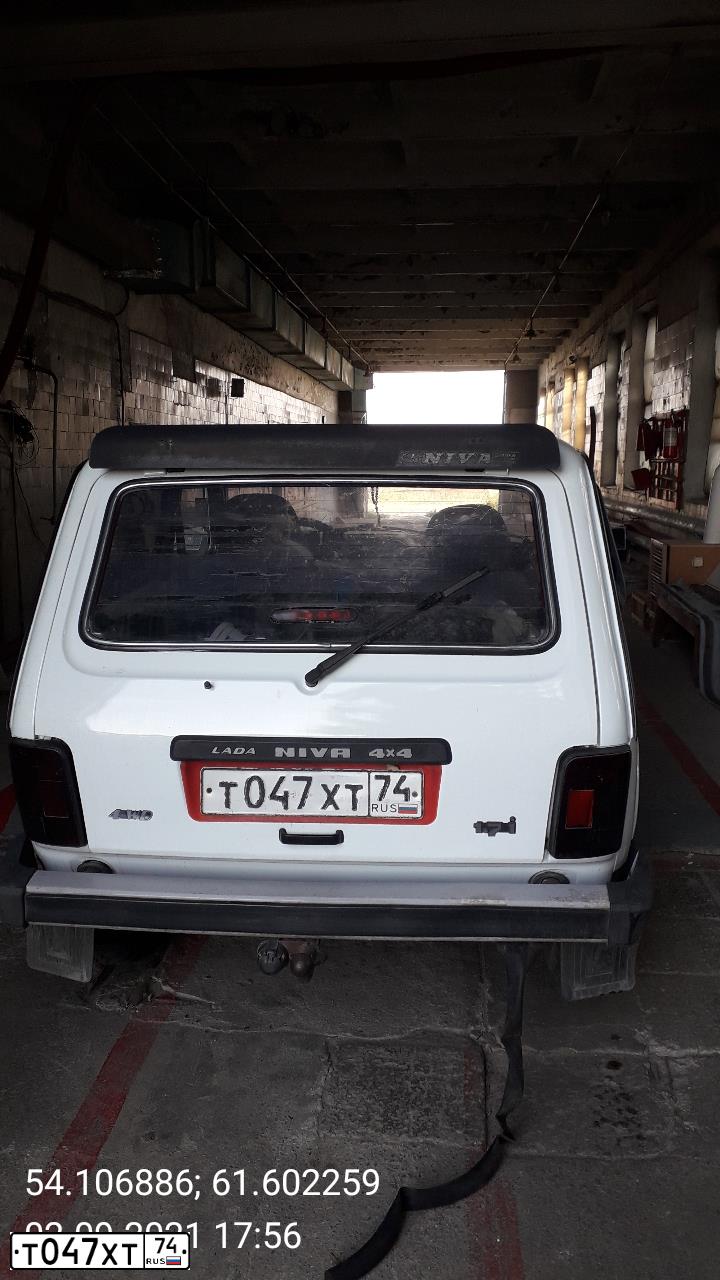 Фото автомобиля LADA 2121 NIVA, 2003 — госномер Т047ХТ74. Цвет: ЯРКО-БЕЛЫЙ