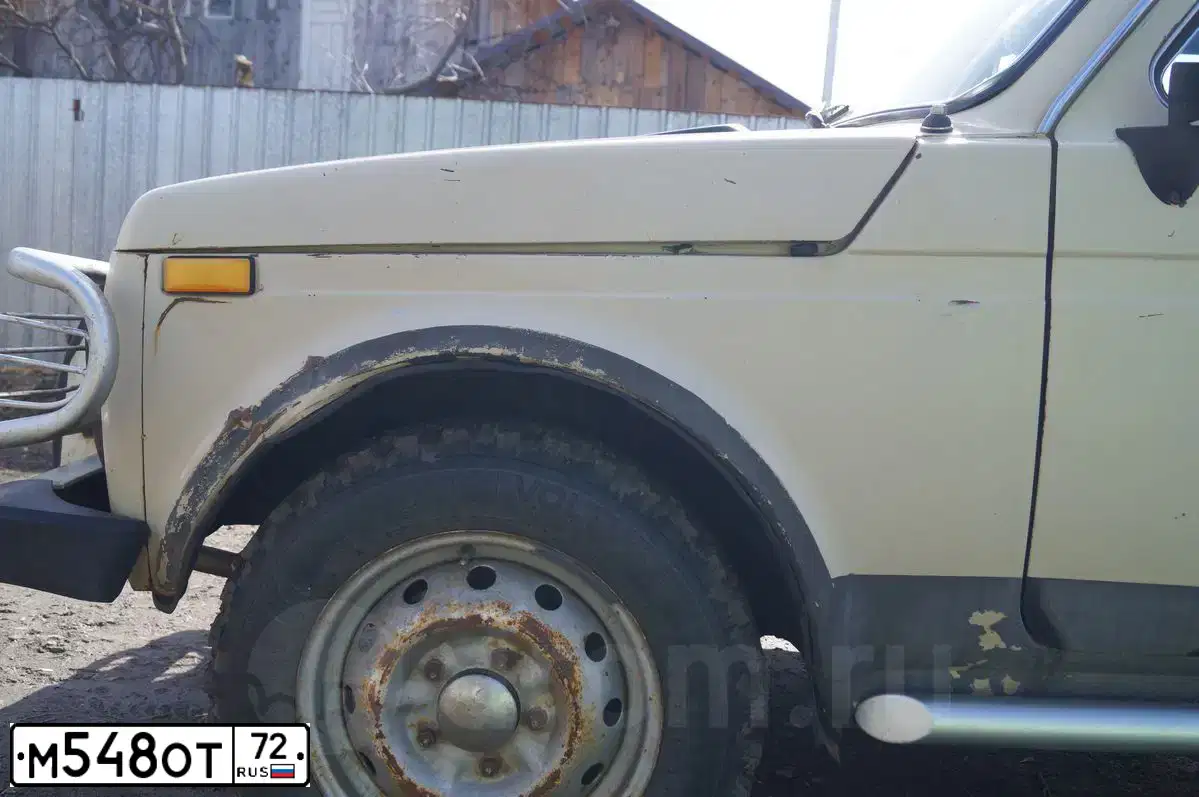 Фото автомобиля LADA 2121 NIVA, 1986 — госномер М548ОТ72. Цвет: БЕЖЕВЫЙ