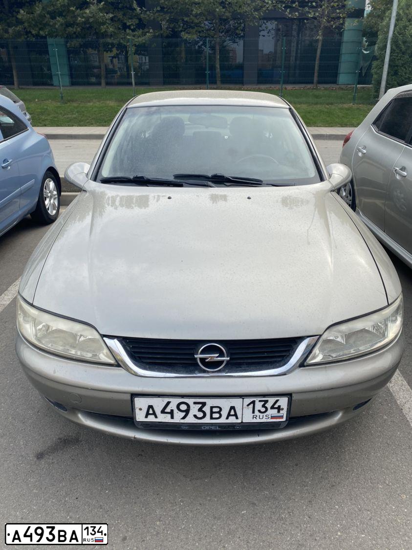 Фото автомобиля OPEL VECTRA, 1999 — госномер А493ВА134. Цвет: ЖЕЛТЫЙ